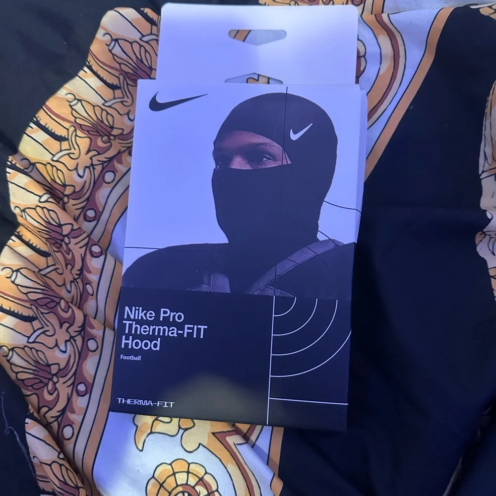Nike Black and Gold Patterned Fabric